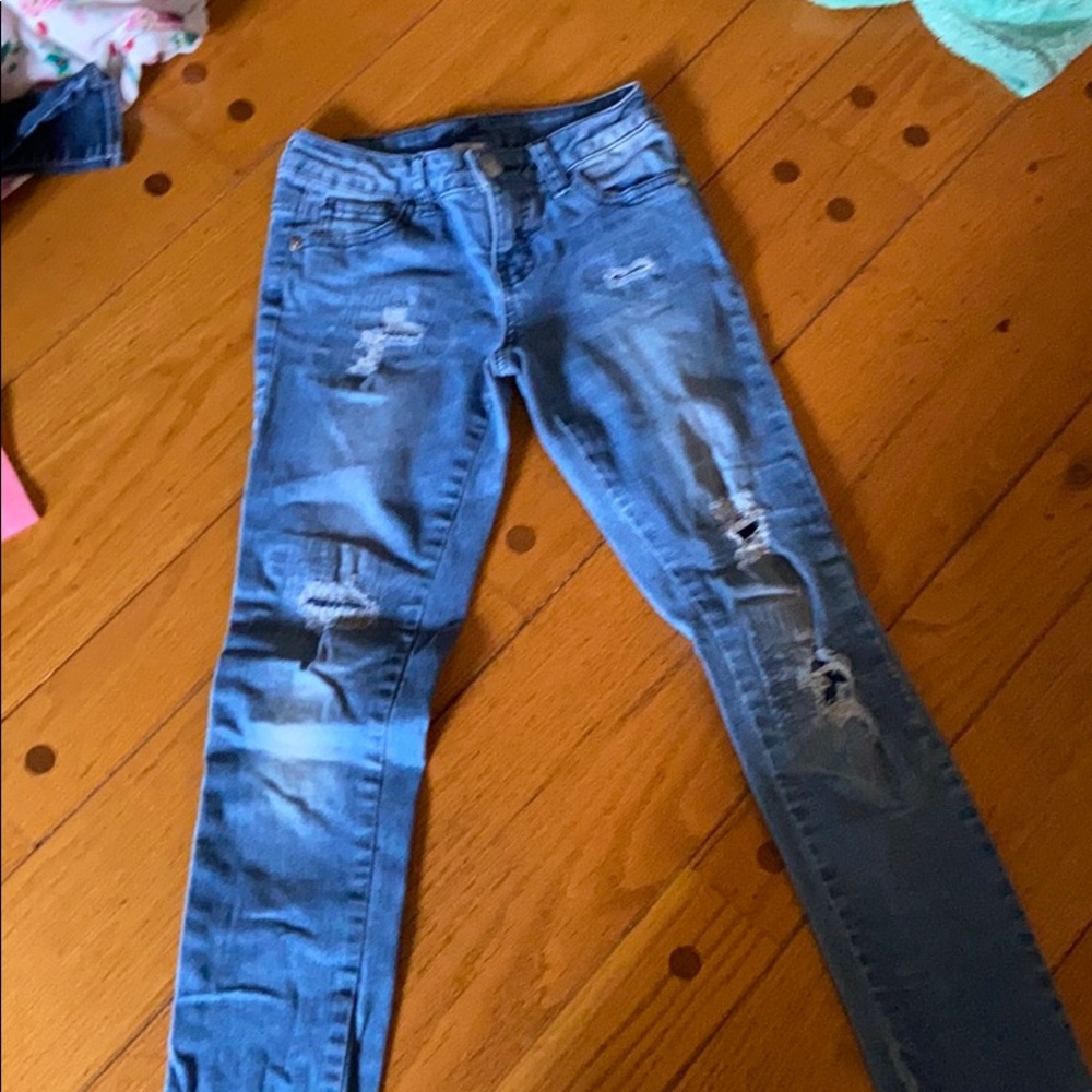 Ripped patched jeans